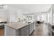 Open kitchen with an island, granite countertops and stainless steel appliances at 1447 Clay Field Trl, Summerville, SC 29485