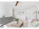 Spacious loft area with light-colored walls and a ceiling fan at 1447 Clay Field Trl, Summerville, SC 29485