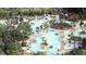 Resort-style pool with multiple areas, loungers, and shaded seating at 1447 Clay Field Trl, Summerville, SC 29485