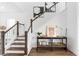 Modern staircase with white railings and dark wood steps at 1447 Clay Field Trl, Summerville, SC 29485