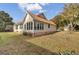 Ranch style home with metal roof and mature landscaping at 2173 Annie Laura Ln, Mount Pleasant, SC 29466