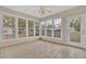 Sunroom featuring tile flooring and access to backyard at 2173 Annie Laura Ln, Mount Pleasant, SC 29466