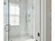 Spa-like bathroom with a large walk-in shower and tiled walls at 2220 Ion Ave, Sullivans Island, SC 29482