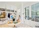Bright entryway with white built-ins and a marble-top table at 2220 Ion Ave, Sullivans Island, SC 29482