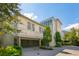 Elevated home with two-car garage and attractive landscaping at 2220 Ion Ave, Sullivans Island, SC 29482