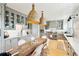 Bright kitchen features an eat-in area and white quartz countertops at 2220 Ion Ave, Sullivans Island, SC 29482