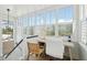Bright and airy home office with built-in desk and plantation shutters at 2220 Ion Ave, Sullivans Island, SC 29482