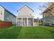 Home with a screened porch and a well-maintained lawn at 313 Oakbend St, Summerville, SC 29486
