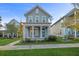 Charming two-story home with gray siding, a front porch, and well-manicured lawn at 313 Oakbend St, Summerville, SC 29486
