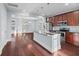 Modern kitchen with stainless steel appliances and a granite countertop island at 313 Oakbend St, Summerville, SC 29486