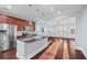 Modern kitchen with stainless steel appliances and a granite countertop island at 313 Oakbend St, Summerville, SC 29486