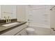 Clean bathroom with a bathtub, shower, and dark vanity countertop at 316 Trailmore Ln, Summerville, SC 29486