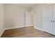 Empty bedroom with wood-look flooring and closet at 316 Trailmore Ln, Summerville, SC 29486