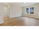 Spacious bedroom with wood-look flooring and a view of the backyard at 316 Trailmore Ln, Summerville, SC 29486