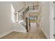 Elegant entryway with hardwood floors and a staircase leading to the second floor at 316 Trailmore Ln, Summerville, SC 29486