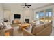 Living room with fireplace and plenty of natural light from sliding glass doors at 316 Trailmore Ln, Summerville, SC 29486