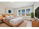 Main bedroom with wood platform bed and large windows at 316 Trailmore Ln, Summerville, SC 29486