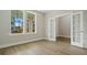 Bright study with hardwood floors and French doors leading to a private office at 316 Trailmore Ln, Summerville, SC 29486