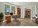 Study with hardwood floors, built in bookcases, and a comfortable work space at 316 Trailmore Ln, Summerville, SC 29486