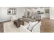 Bright living room with adjacent kitchen and hardwood floors at 319 Calm Water Way, Summerville, SC 29486