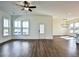 Open living room with hardwood floors and ceiling fan at 346 Trailmore Ln, Summerville, SC 29486
