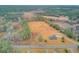 Aerial view of property showing the home, large lot, and surrounding landscape at 388 E Main St, Harleyville, SC 29448