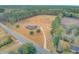 Property view showcasing home and expansive acreage at 388 E Main St, Harleyville, SC 29448