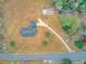 Home situated on a large lot with paved driveway at 388 E Main St, Harleyville, SC 29448