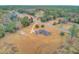 Aerial view of property showcasing the home, lot size, and surrounding environment at 388 E Main St, Harleyville, SC 29448