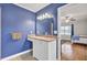 Bathroom with a vanity, and view into bedroom at 388 E Main St, Harleyville, SC 29448