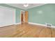 Spacious bedroom featuring hardwood floors and ample closet space at 388 E Main St, Harleyville, SC 29448
