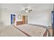 Main bedroom with large bed and en-suite bathroom at 388 E Main St, Harleyville, SC 29448