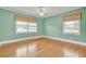 Bright bedroom with hardwood floors and large windows at 388 E Main St, Harleyville, SC 29448