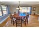 Round dining table with six chairs at 388 E Main St, Harleyville, SC 29448