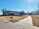Long driveway leading to home at 388 E Main St, Harleyville, SC 29448