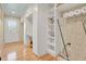 Laundry room with built-in shelving and storage at 388 E Main St, Harleyville, SC 29448