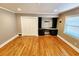 Bright office space with hardwood floors and built-in desk at 388 E Main St, Harleyville, SC 29448