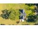 House with large yard, tree shadows, and view of surrounding land at 4751 River Rd, Johns Island, SC 29455