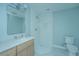 Light and airy bathroom with a shower and updated vanity at 738 Olney Rd, Charleston, SC 29414