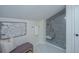 Spa-like bathroom with a glass enclosed shower and built in bench at 738 Olney Rd, Charleston, SC 29414