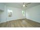 Well-lit bedroom with hardwood floors and two windows at 738 Olney Rd, Charleston, SC 29414