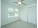 Bedroom with double windows and ceiling fan at 738 Olney Rd, Charleston, SC 29414
