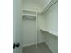 Bright walk-in closet with hanging rod and shelving at 738 Olney Rd, Charleston, SC 29414