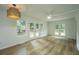 Bright dining room with hardwood floors and access to a deck at 738 Olney Rd, Charleston, SC 29414
