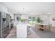 Modern kitchen with stainless steel appliances and white cabinetry at 738 Olney Rd, Charleston, SC 29414