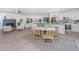 Open concept kitchen and dining area, featuring stainless steel appliances and an island at 738 Olney Rd, Charleston, SC 29414