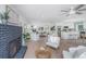 Cozy living room with fireplace and hardwood floors, featuring comfortable seating at 738 Olney Rd, Charleston, SC 29414
