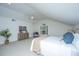 Main bedroom features a king-size bed, sitting area, and plenty of natural light at 738 Olney Rd, Charleston, SC 29414