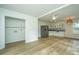 Open floor plan showing kitchen, dining area, and laundry closet at 738 Olney Rd, Charleston, SC 29414