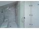 Spa-like shower with marble tile, glass enclosure, and built-in seat at 738 Olney Rd, Charleston, SC 29414